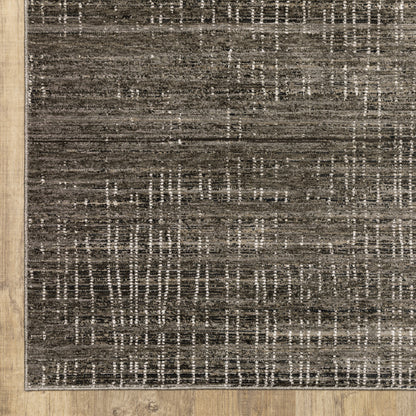 2' X 8' Charcoal Grey Grey Ivory Tan And Brown Abstract Power Loom Stain Resistant Runner Rug