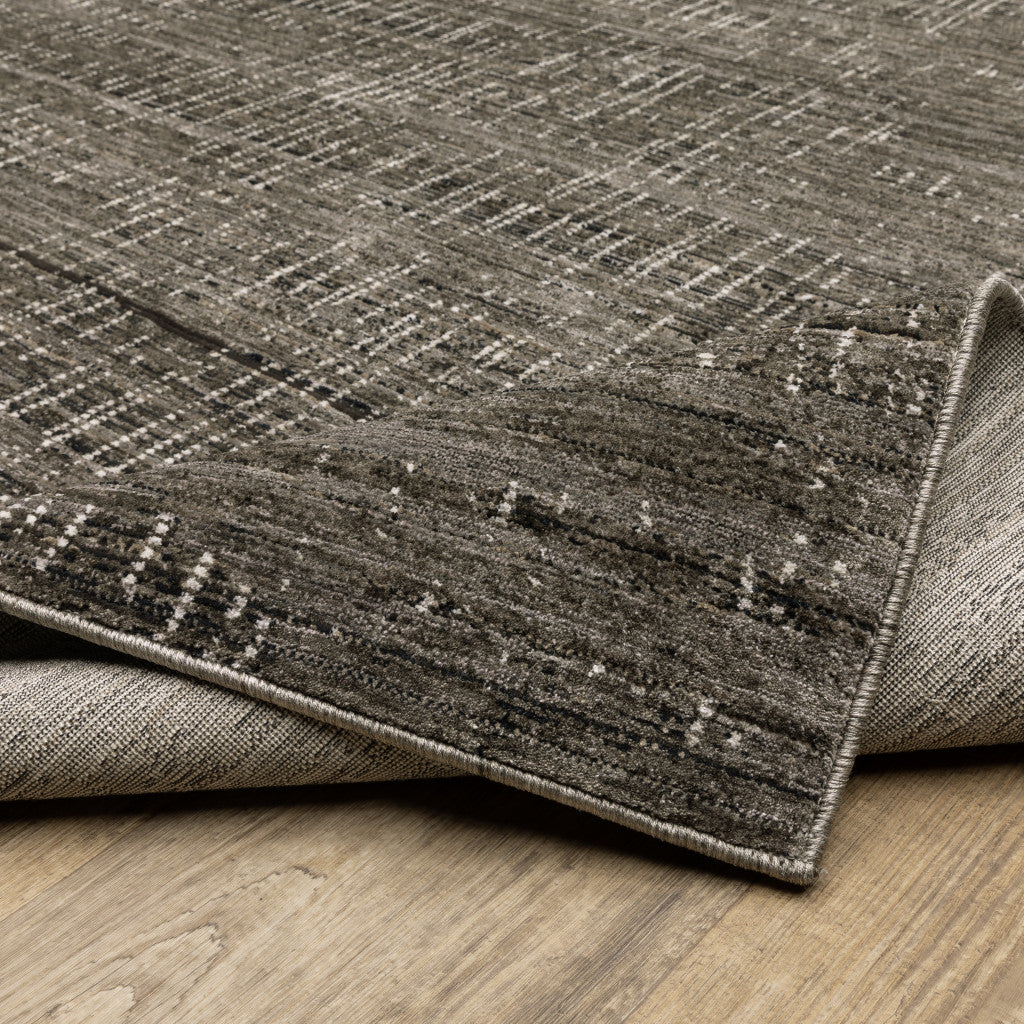 2' X 8' Charcoal Grey Grey Ivory Tan And Brown Abstract Power Loom Stain Resistant Runner Rug