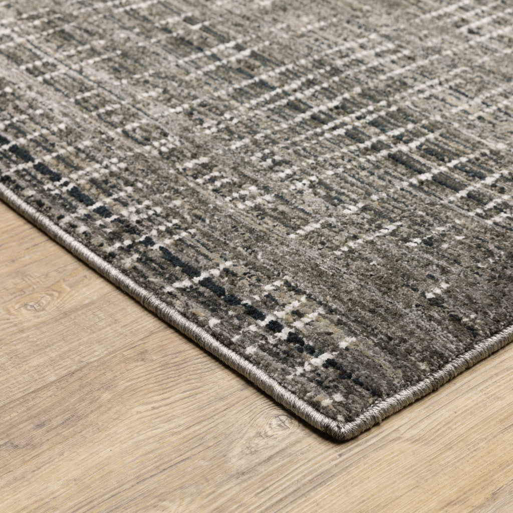 5' X 8' Charcoal Grey Grey Ivory Tan And Brown Abstract Power Loom Stain Resistant Area Rug