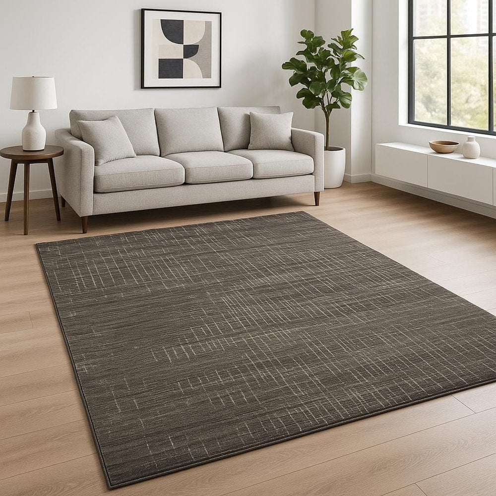 10' X 13' Charcoal Grey Grey Ivory Tan And Brown Abstract Power Loom Stain Resistant Area Rug