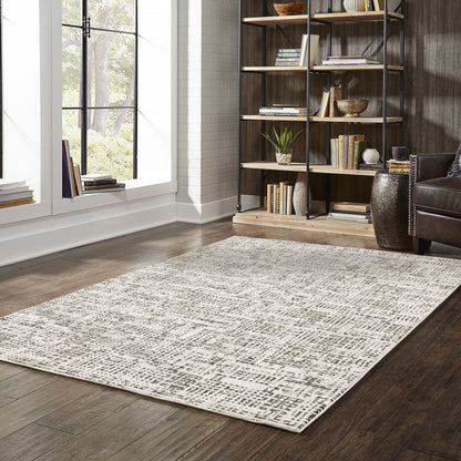 3' X 5' Ivory Grey Charcoal Brown And Beige Abstract Power Loom Stain Resistant Area Rug