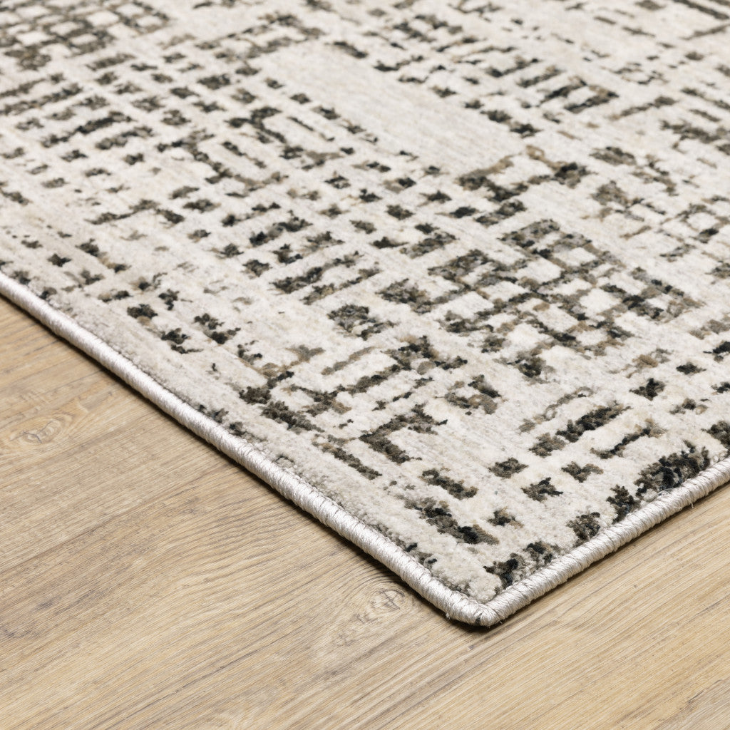 5' X 8' Ivory Grey Charcoal Brown And Beige Abstract Power Loom Stain Resistant Area Rug