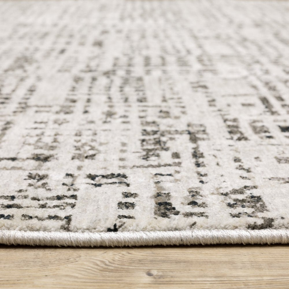 7' X 10' Ivory And Gray Abstract Area Rug