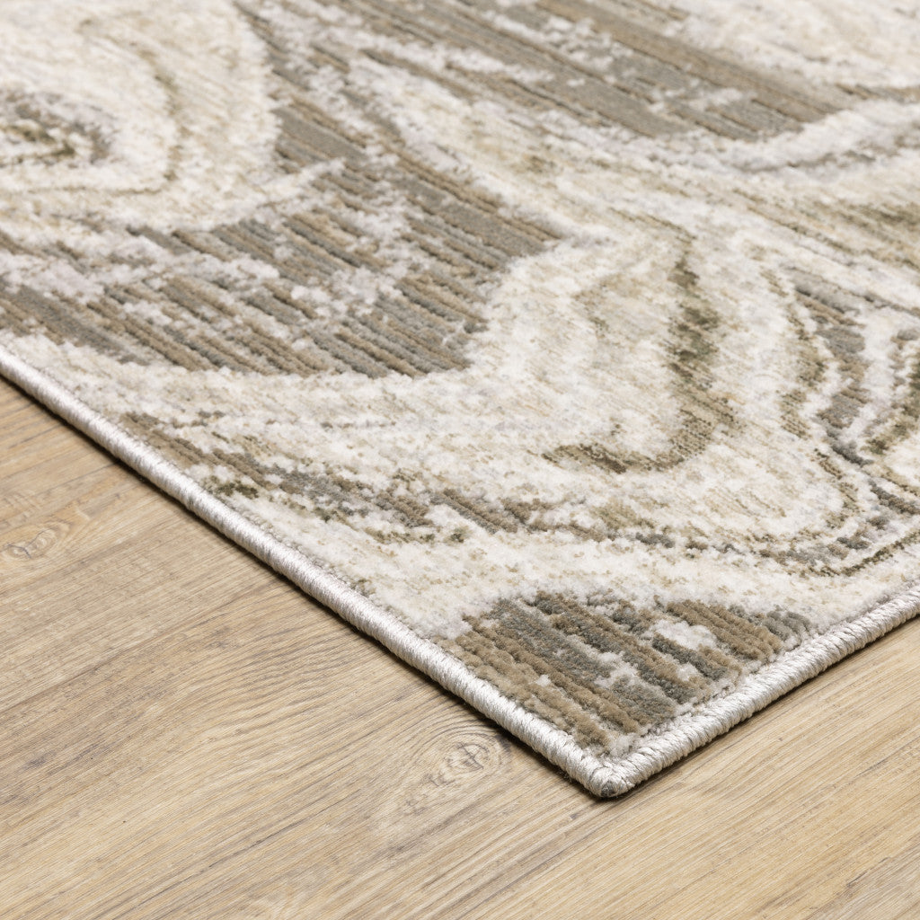 6' X 9' Beige And Ivory Abstract Power Loom Stain Resistant Area Rug