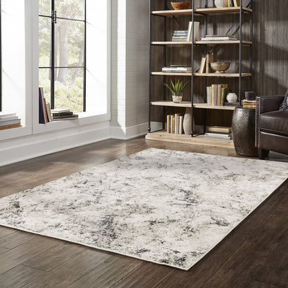 3' X 5' Ivory Grey Black Beige And Tan Abstract Power Loom Stain Resistant Area Rug