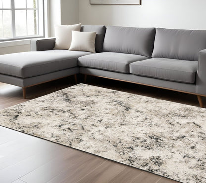7' X 10' Ivory And Gray Abstract Area Rug