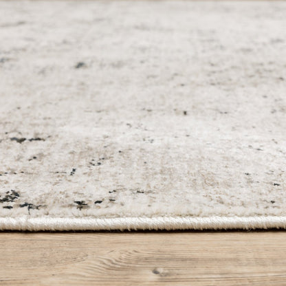 10' X 13' Ivory Grey Black Beige And Tan Abstract Power Loom Stain Resistant Area Rug