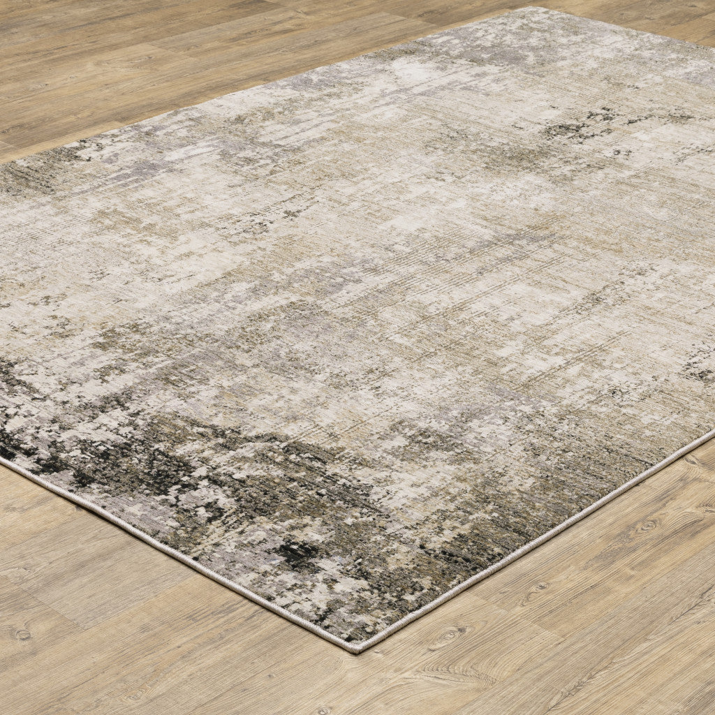 6' X 9' Beige Grey Ivory Tan And Brown Abstract Power Loom Stain Resistant Area Rug