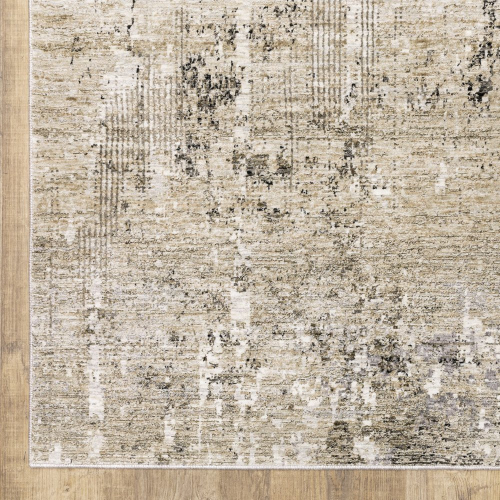 10' X 13' Beige Grey Ivory Tan And Brown Abstract Power Loom Stain Resistant Area Rug