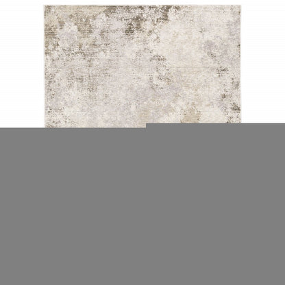 5' X 8' Beige Ivory Tan Grey And Brown Abstract Power Loom Stain Resistant Area Rug