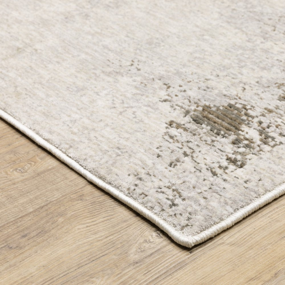 8' X 11' Ivory And Beige Abstract Distressed Area Rug