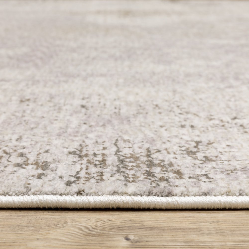 8' X 11' Ivory And Beige Abstract Distressed Area Rug