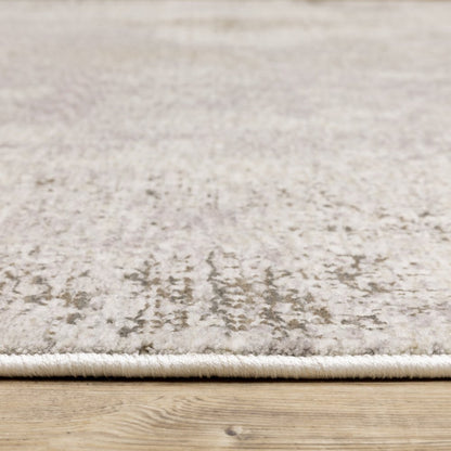 8' X 11' Ivory And Beige Abstract Distressed Area Rug