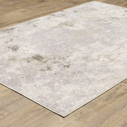 8' X 11' Ivory And Beige Abstract Distressed Area Rug