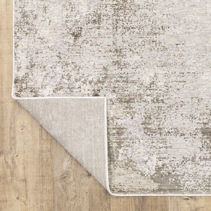 8' X 11' Ivory And Beige Abstract Distressed Area Rug