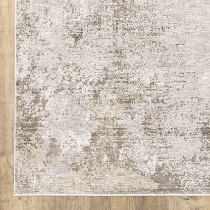 8' X 11' Beige Ivory Tan Grey And Brown Abstract Power Loom Stain Resistant Area Rug