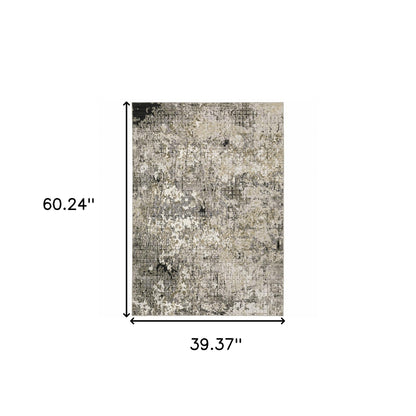 3' X 5' Grey Ivory Beige Charcoal Black Tan And Brown Abstract Power Loom Stain Resistant Area Rug