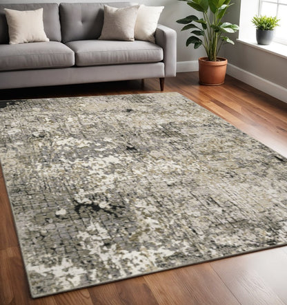 5' X 8' Grey Ivory Beige Charcoal Black Tan And Brown Abstract Power Loom Stain Resistant Area Rug
