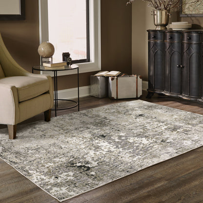 5' X 8' Grey Ivory Beige Charcoal Black Tan And Brown Abstract Power Loom Stain Resistant Area Rug