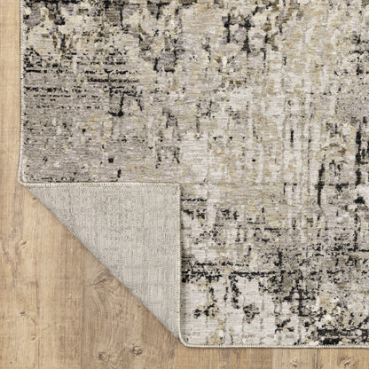 5' X 8' Grey Ivory Beige Charcoal Black Tan And Brown Abstract Power Loom Stain Resistant Area Rug