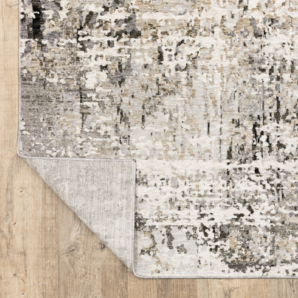 3' X 5' Grey Ivory Beige Charcoal Black Tan And Brown Abstract Power Loom Stain Resistant Area Rug