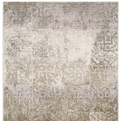 5' X 8' Ivory Grey Tan Brown And Beige Abstract Power Loom Stain Resistant Area Rug