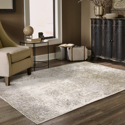 5' X 8' Ivory Grey Tan Brown And Beige Abstract Power Loom Stain Resistant Area Rug