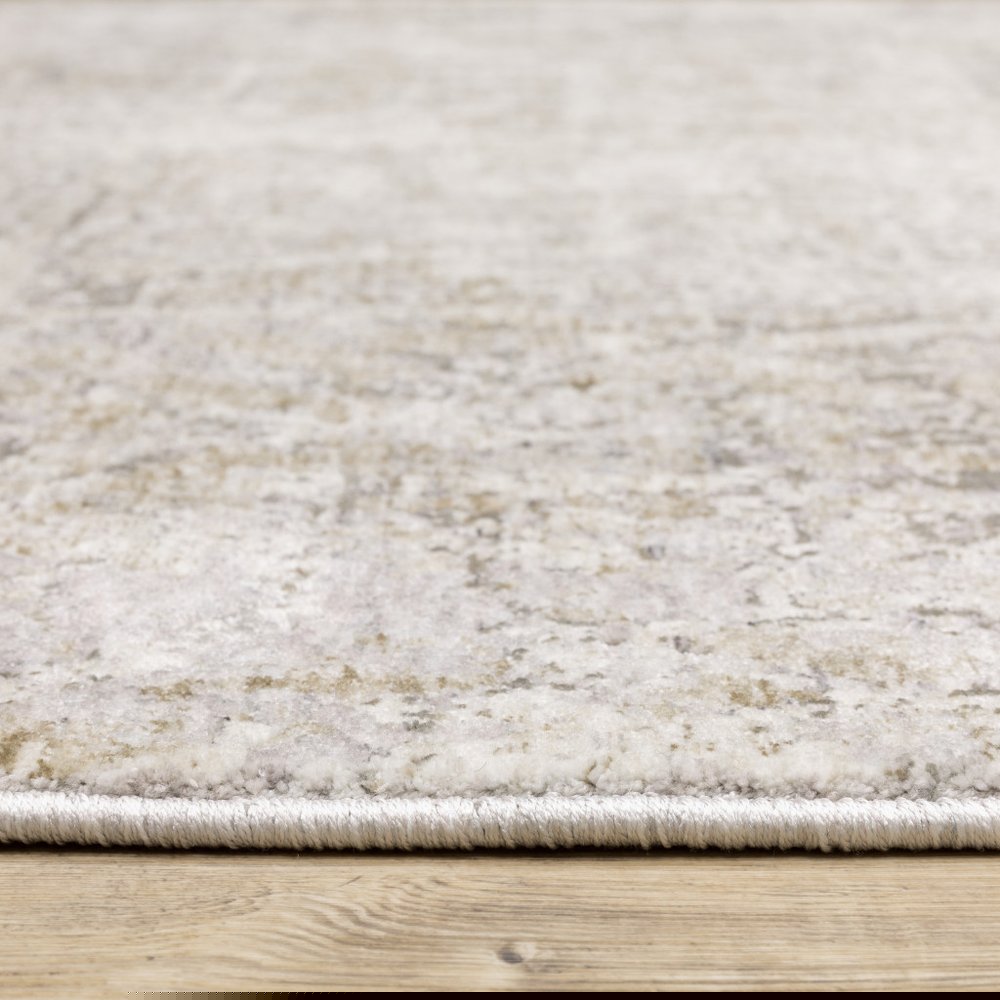 6' X 9' Ivory Grey Tan Brown And Beige Abstract Power Loom Stain Resistant Area Rug