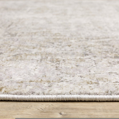 6' X 9' Ivory Grey Tan Brown And Beige Abstract Power Loom Stain Resistant Area Rug