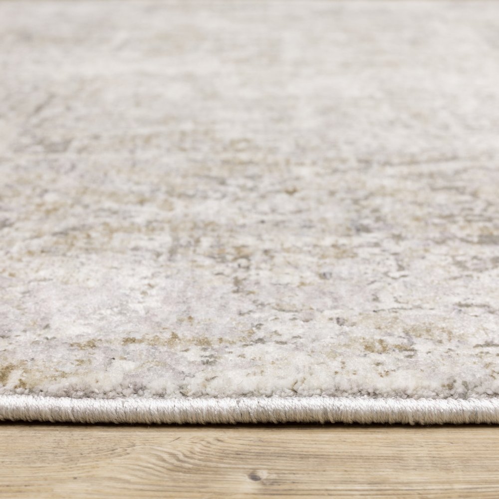 8' X 11' Ivory Grey Tan Brown And Beige Abstract Power Loom Stain Resistant Area Rug