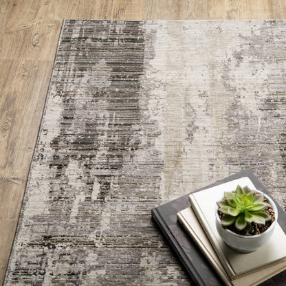 2' X 8' Grey Beige Charcoal Brown Tan And Ivory Abstract Power Loom Stain Resistant Runner Rug