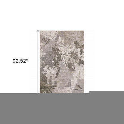 5' X 8' Grey Ivory Beige Tan Brown And Black Abstract Power Loom Stain Resistant Area Rug