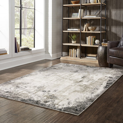 5' X 8' Grey Ivory Charcoal Tan Black And Beige Abstract Power Loom Stain Resistant Area Rug