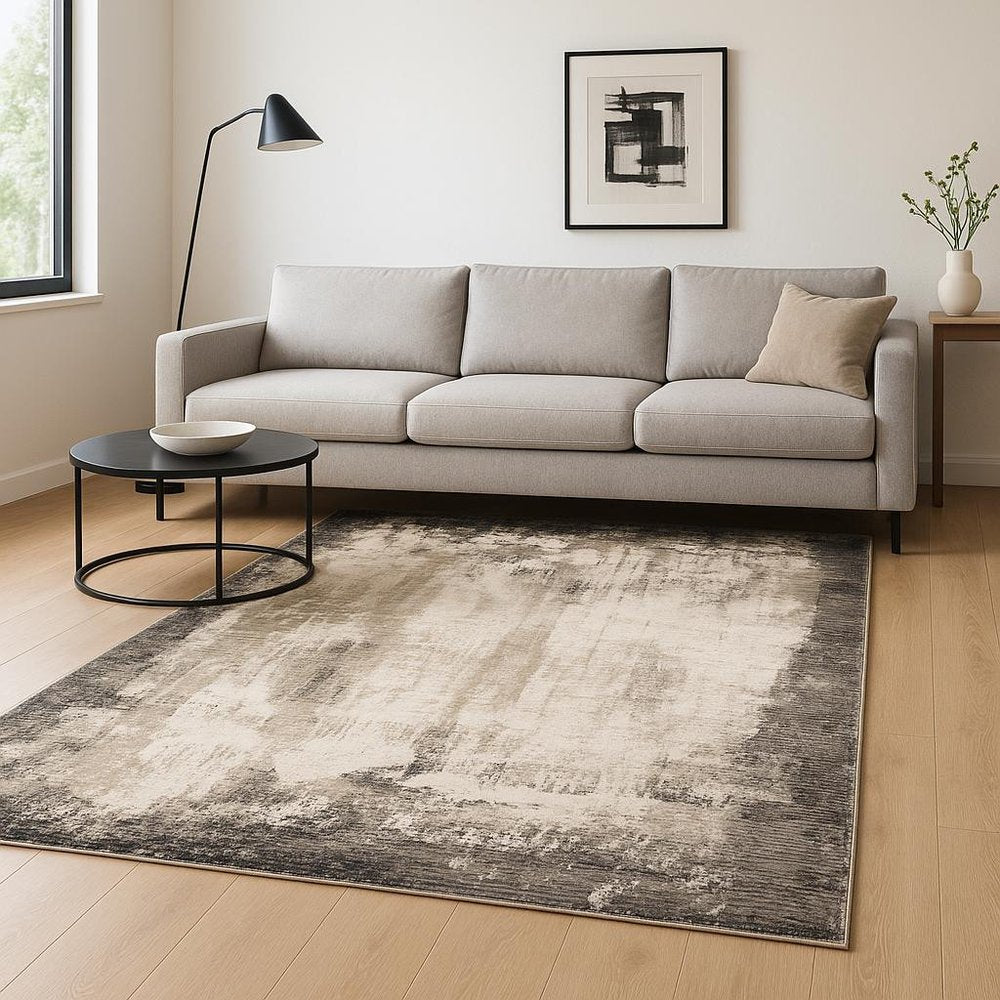 6' X 9' Grey Ivory Charcoal Tan Black And Beige Abstract Power Loom Stain Resistant Area Rug