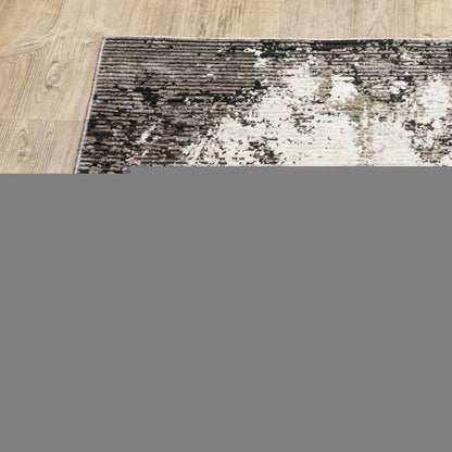 8' X 11' Grey Ivory Charcoal Tan Black And Beige Abstract Power Loom Stain Resistant Area Rug