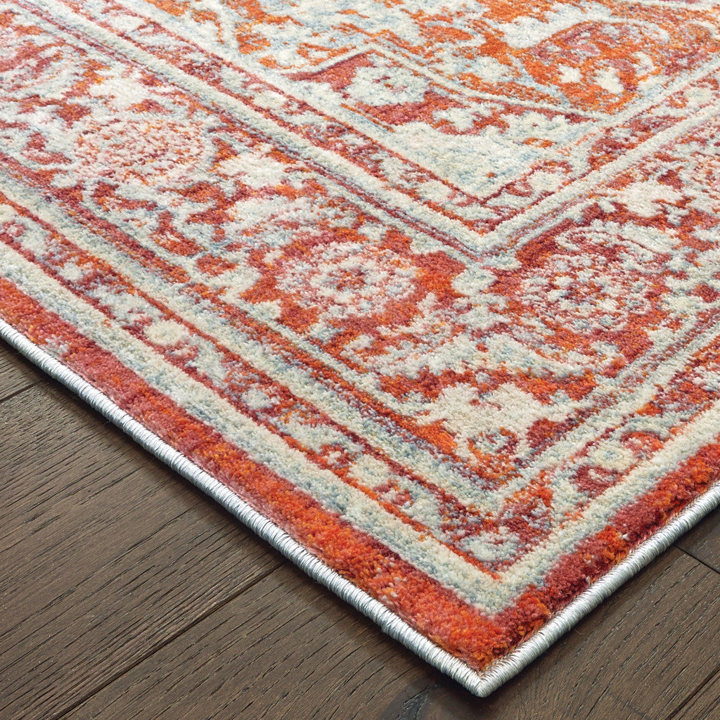 10' X 13' Grey And Orange Oriental Power Loom Stain Resistant Area Rug