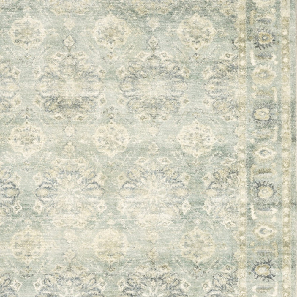 5' X 7' Green And Ivory Oriental Power Loom Stain Resistant Area Rug