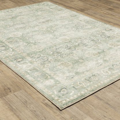 5' X 7' Green And Ivory Oriental Power Loom Stain Resistant Area Rug