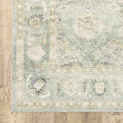 5' X 7' Green And Ivory Oriental Power Loom Stain Resistant Area Rug