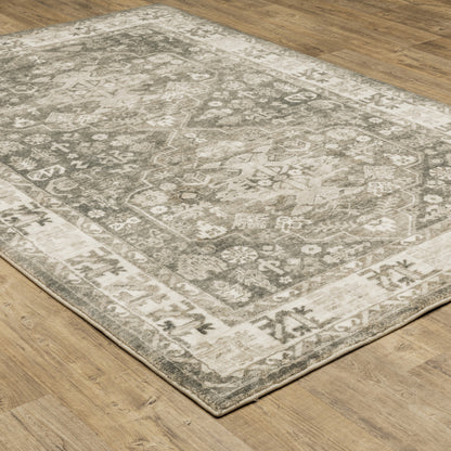 5' X 7' Grey Ivory Tan And Beige Oriental Power Loom Stain Resistant Area Rug