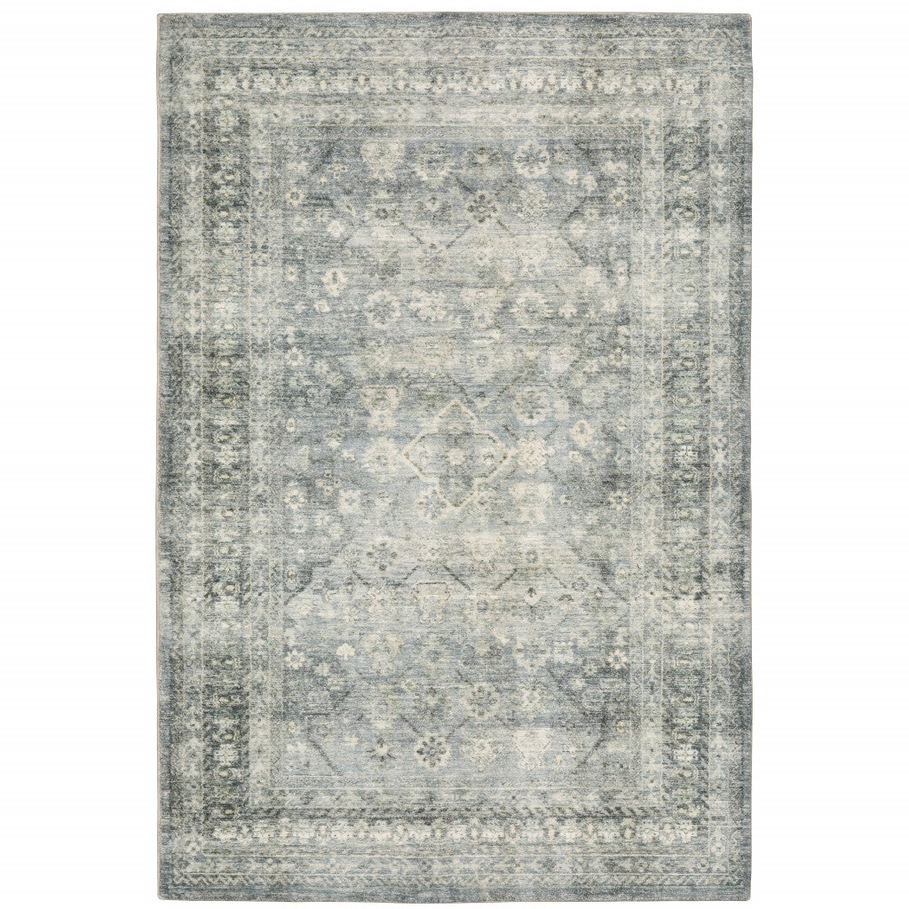 5' X 7' Blue Ivory And Grey Oriental Power Loom Stain Resistant Area Rug