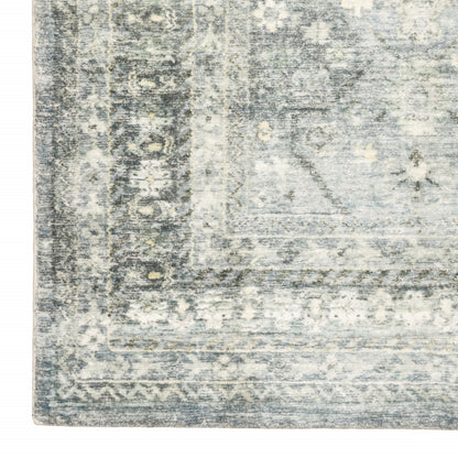 5' X 7' Blue Ivory And Grey Oriental Power Loom Stain Resistant Area Rug