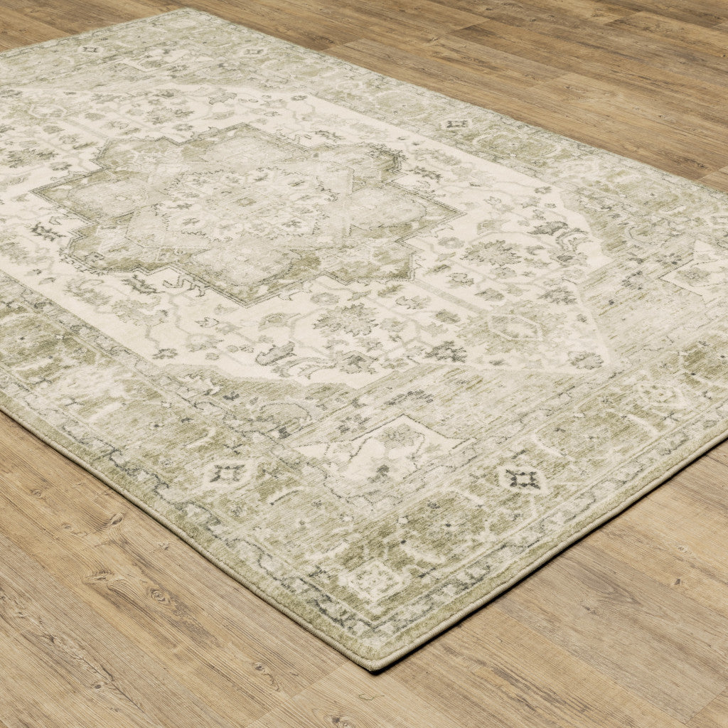 5' X 7' Tan Ivory Grey And Beige Oriental Power Loom Stain Resistant Area Rug