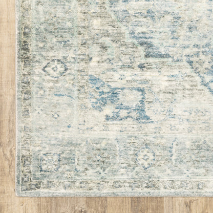 5' X 7' Grey Blue And Ivory Oriental Power Loom Stain Resistant Area Rug