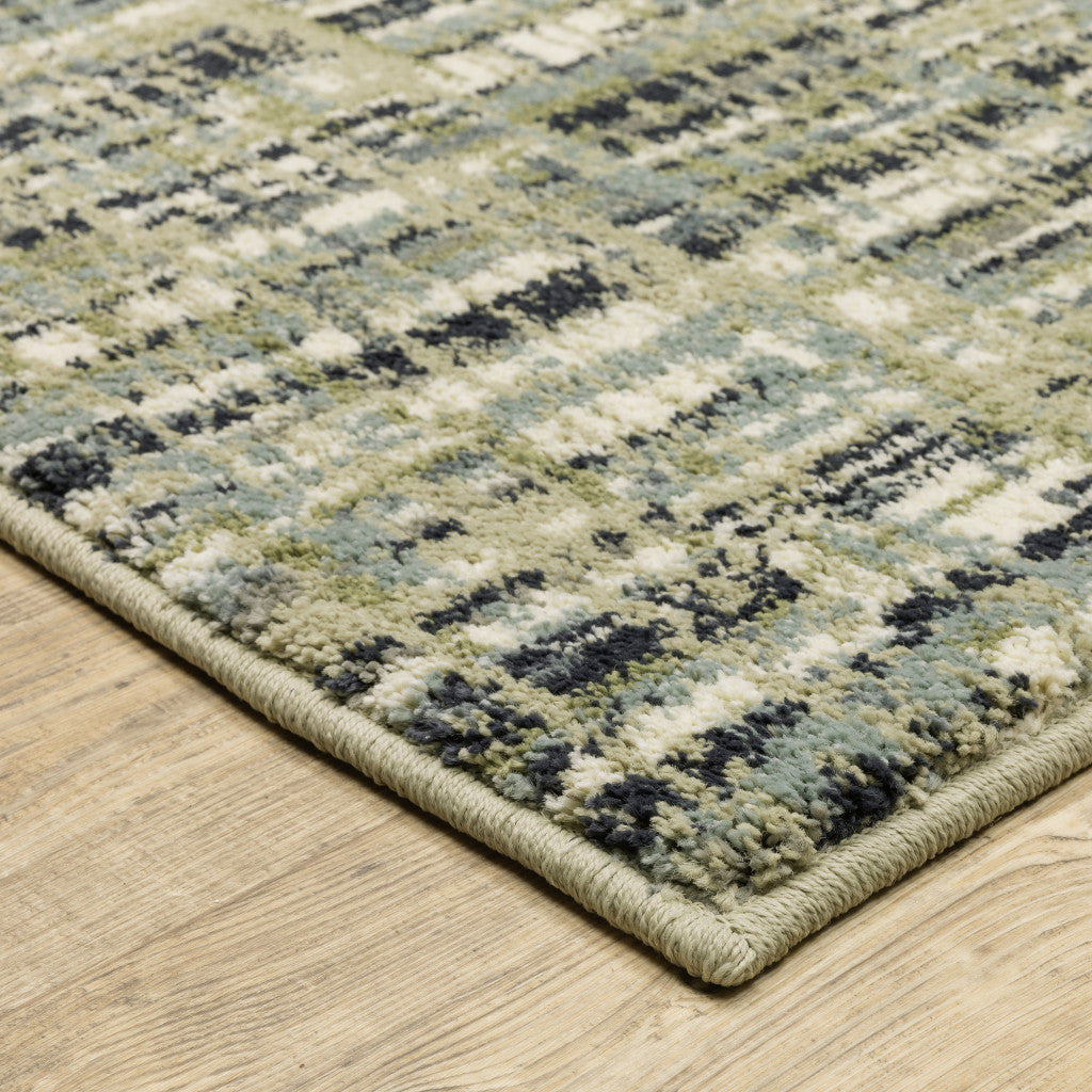 6' X 9' Green Blue Ivory Beige And Light Blue Abstract Power Loom Stain Resistant Area Rug