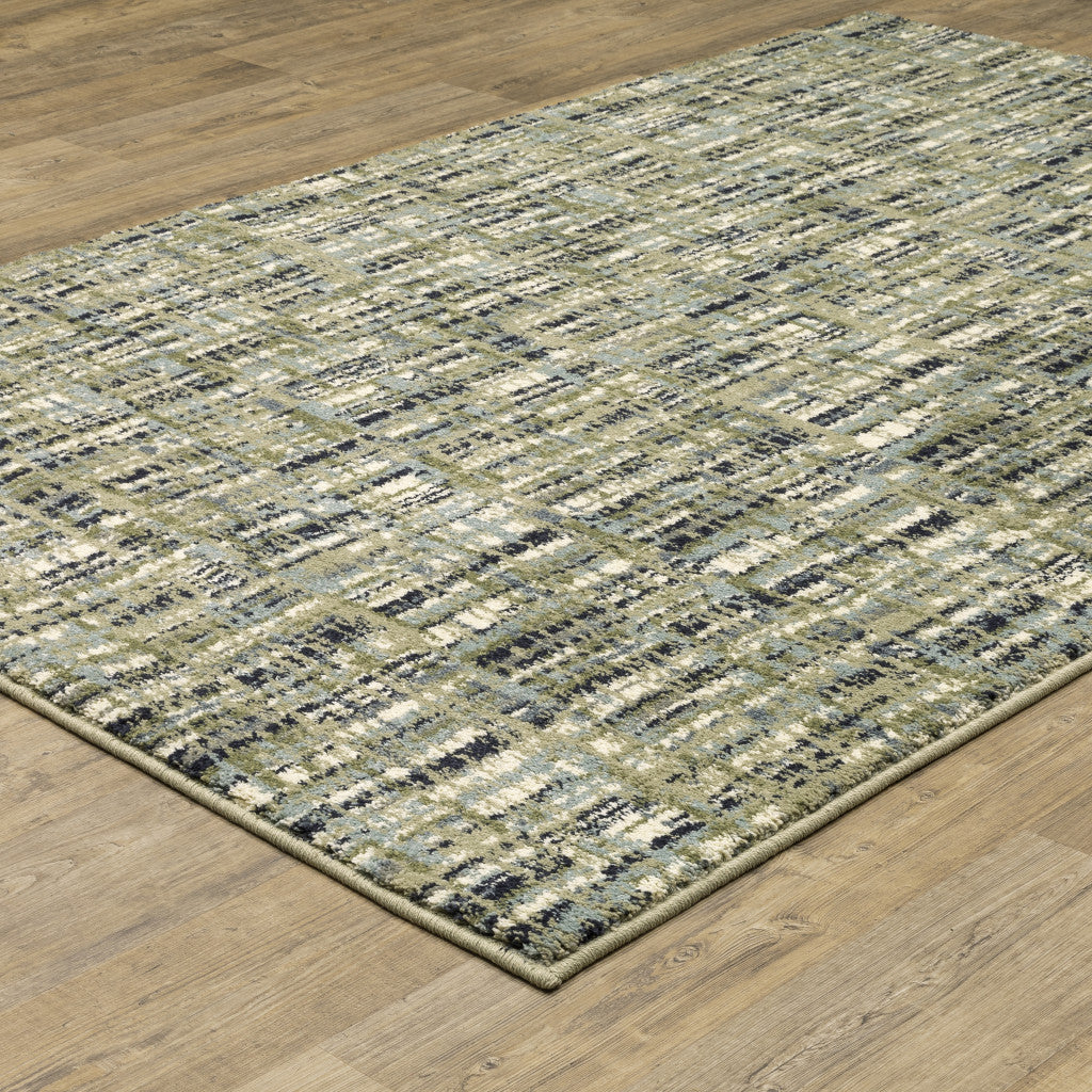 6' X 9' Green Blue Ivory Beige And Light Blue Abstract Power Loom Stain Resistant Area Rug