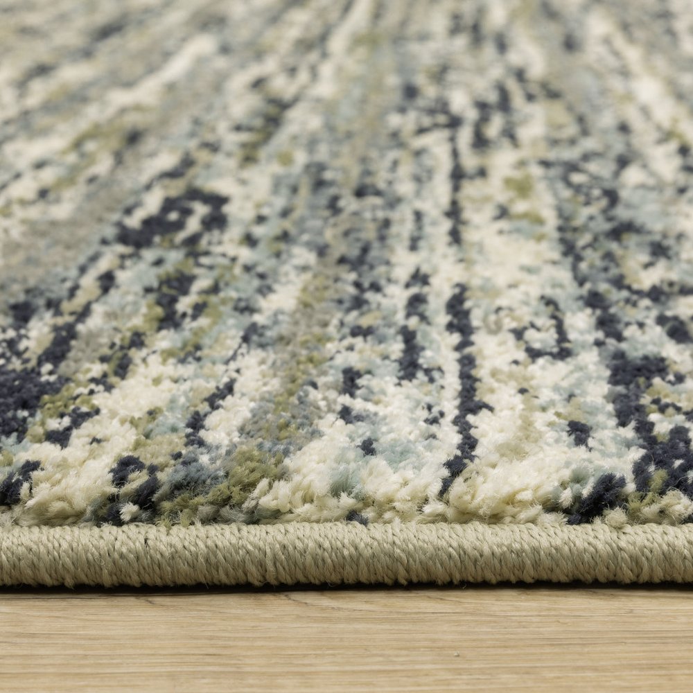 10' X 13' Blue Green Light Blue Grey And Ivory Abstract Power Loom Stain Resistant Area Rug