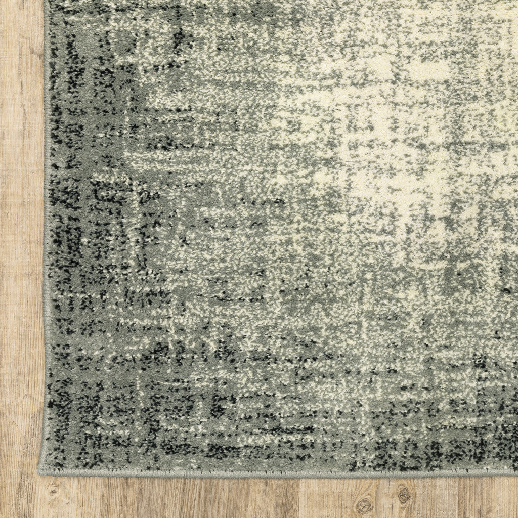 5' X 7' Grey Beige And Blue Power Loom Stain Resistant Area Rug