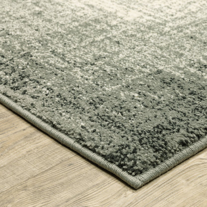 10' X 13' Grey Beige And Blue Power Loom Stain Resistant Area Rug