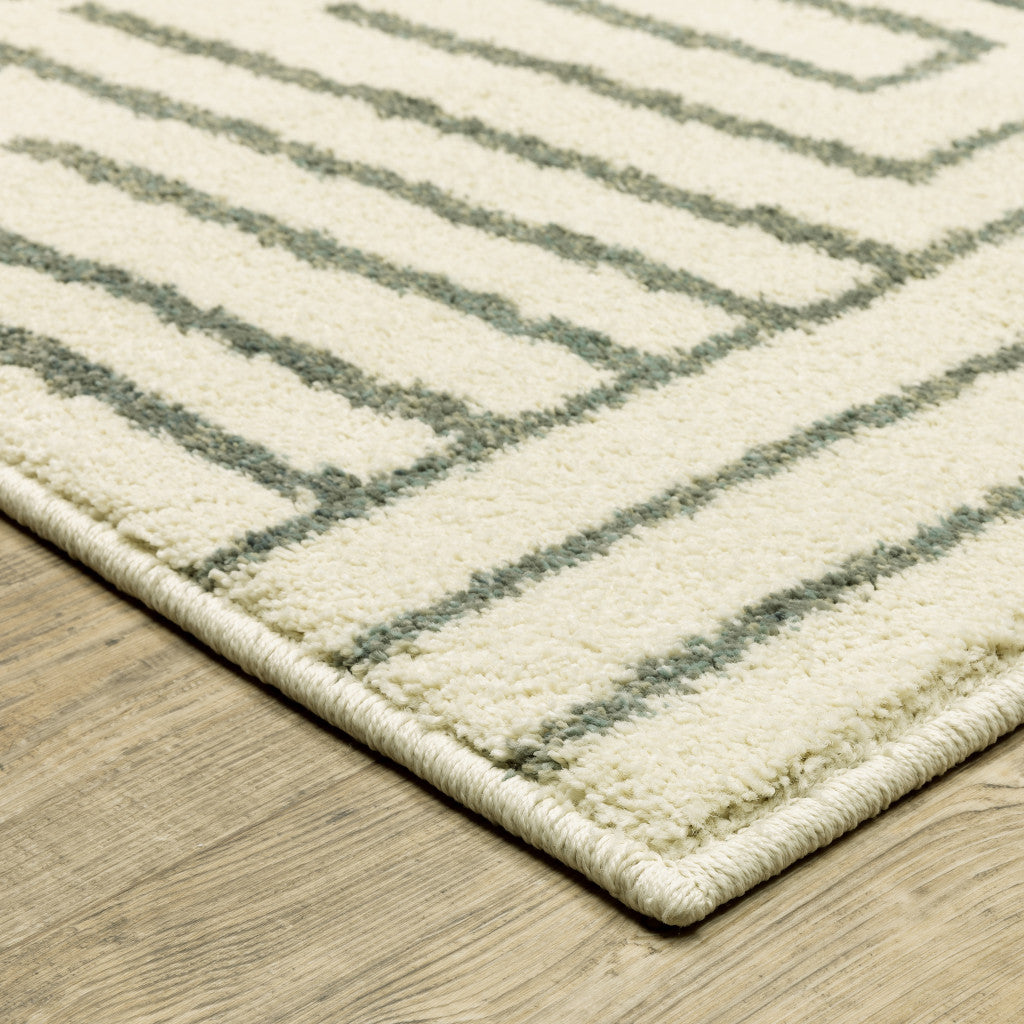 2' X 3' Beige Grey And Light Blue Geometric Power Loom Stain Resistant Area Rug